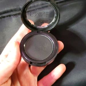 black eye shadow, veryyyy black. used once.